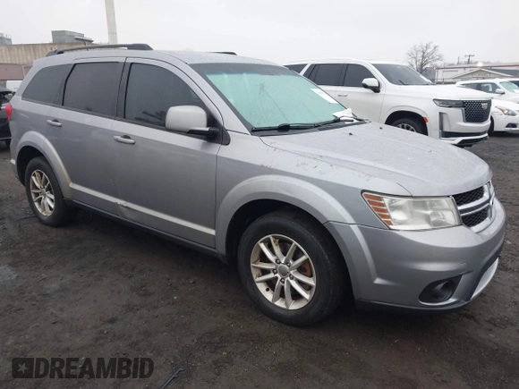 2016 Dodge Journey SXT with VIN 3C4PDDBG2GT242127, listed as a IAAI auction lot 41485555 with 119,728 mi miles. Bid and sale history available at carsss.com. Image 1.