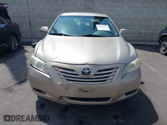 2007 Toyota Camry CE with VIN 4T1BE46KX7U716414, listed as a IAAI auction lot 42116250 with 104,298 mi miles and . Bid and sale history available at DreamBid. Image 12.