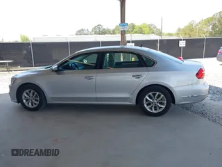 2016 Volkswagen Passat S with VIN 1VWAS7A38GC031521, listed as a IAAI auction lot 42069429 with 94,938 mi miles and . Bid and sale history available at DreamBid. Image 14.