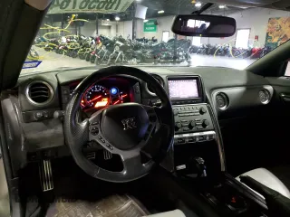 2009 Nissan GT-R Premium с VIN JN1AR54F89M252013, выставлен на аукционе Copart как лот 70656764 с пробегом 66 085 миль миль и Списание • Salvage title. История ставок и продаж доступна на DreamBid. Изображение 7.