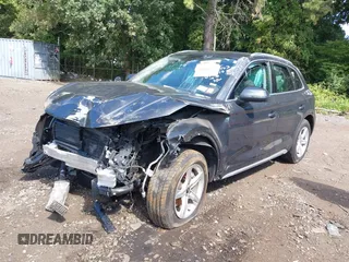 2021 Audi Q5 Premium with VIN WA1AAAFY8M2119097, listed as a IAAI auction lot 40308722 with 57,666 mi miles. Bid and sale history available at carsss.com. Image 2.