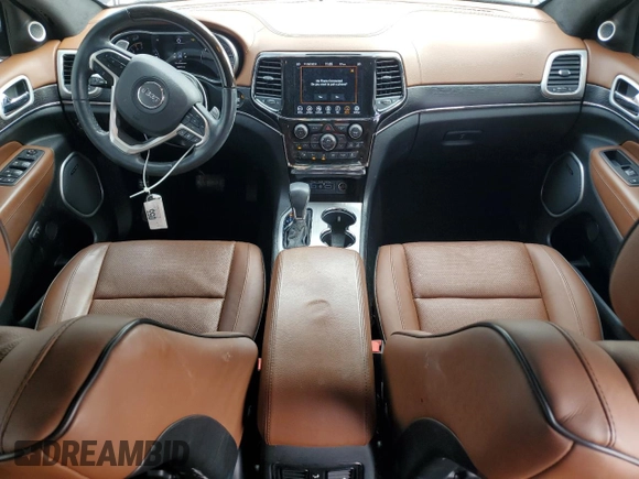 2020 Jeep Grand Cherokee Summit with VIN 1C4RJFJT1LC180477, listed as a Copart auction lot 84943334 with 33,870 mi miles and Salvage title. Bid and sale history available at DreamBid. Image 8.