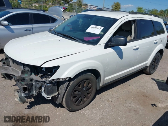 2017 Dodge Journey SE with VIN 3C4PDCAB5HT569154, listed as a IAAI auction lot 41891552 with 126,861 mi miles and . Bid and sale history available at DreamBid. Image 17.