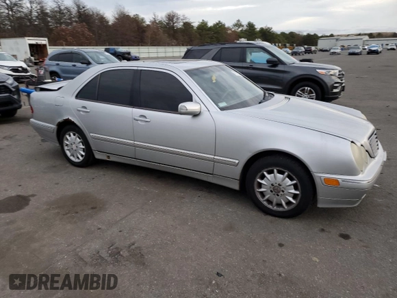 2000 Mercedes-Benz E-Class with VIN WDBJF65J8YB153103, listed as a Copart auction lot 80986234 with 144,205 mi miles and Salvage Title. Bid and sale history available at carsss.com. Image 4.
