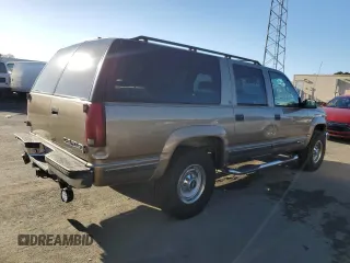 1996 Chevrolet Suburban z VIN 3GNGK26JXTG107228, wystawiony jako Copart lot #44741195 z przebiegiem 172 053 mil mil oraz Czysty tytuł • Clean title. Historia ofert i sprzedaży dostępna na DreamBid. Obrazek 3.