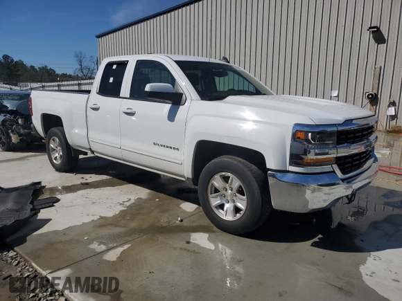 2018 Chevrolet Silverado 1500 LT with VIN 1GCRCREC1JZ363393, listed as a Copart auction lot 49255255 with 105,487 mi miles and Salvage Title. Bid and sale history available at DreamBid. Image 4.