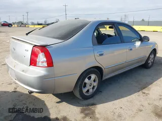 2003 Kia Spectra GS z VIN KNAFB161535095413, wystawiony jako IAAI lot #41478418 z przebiegiem 141 441 mil mil oraz . Historia ofert i sprzedaży dostępna na DreamBid. Obrazek 4.