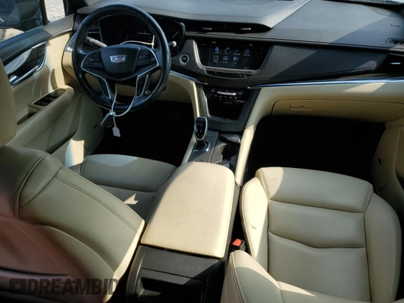 2017 Cadillac XT5 FWD with VIN 1GYKNARS0HZ283618, listed as a Copart auction lot 61640005 with 113,823 mi miles and Salvage title. Bid and sale history available at DreamBid. Image 8.