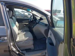 2012 Honda Odyssey EX-L with VIN 5FNRL5H6XCB061026, listed as a IAAI auction lot 42574612 with 144,480 mi miles and . Bid and sale history available at DreamBid. Image 5.