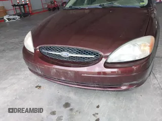 2001 Ford Taurus SE with VIN 1FAFP53U71A122602, listed as a IAAI auction lot 41929048 with 125,815 mi miles and . Bid and sale history available at carsss.com. Image 6.