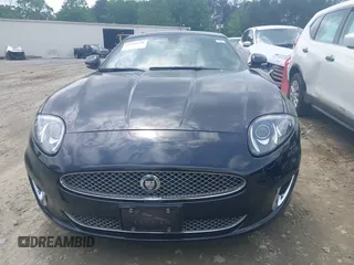 2012 Jaguar XK with VIN SAJWA4FB8CLB47049, listed as a IAAI auction lot 42118136 with 60,953 mi miles. Bid and sale history available at carsss.com. Image 6.