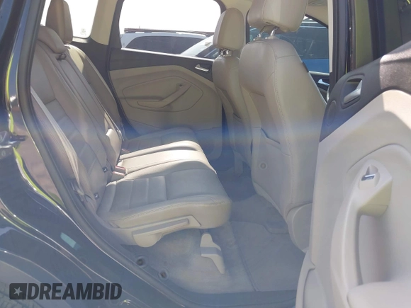2016 Ford Escape Titanium with VIN 1FMCU0JX5GUC88013, listed as a IAAI auction lot 41933751 with 77,789 mi miles. Bid and sale history available at carsss.com. Image 8.
