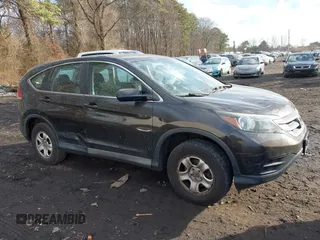 2014 Honda CR-V LX with VIN 2HKRM4H30EH685256, listed as a IAAI auction lot 41429604 with 121,495 mi miles. Bid and sale history available at carsss.com. Image 13.