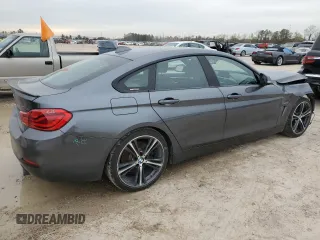 2018 BMW 4 Series 440i with VIN WBA4J5C53JBF07516, listed as a Copart auction lot 86118784 with 154,460 mi miles and Salvage Title. Bid and sale history available at DreamBid. Image 3.
