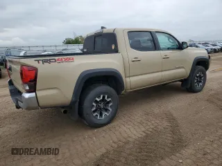 2018 Toyota Tacoma SR with VIN 3TMCZ5AN8JM145862, listed as a Copart auction lot 60190215 with 81,909 mi miles and Salvage title. Bid and sale history available at DreamBid. Image 3.