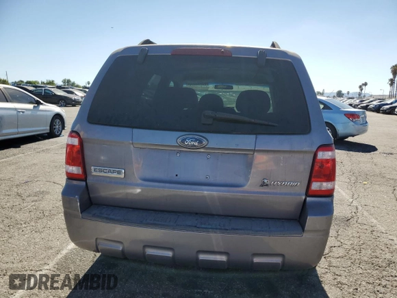 2008 Ford Escape Hybrid with VIN 1FMCU49H58KA30317, listed as a Copart auction lot 65993855 with 113,838 mi miles and Clean title. Bid and sale history available at DreamBid. Image 6.
