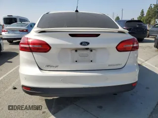 2017 Ford Focus Titanium with VIN 1FADP3J2XHL291606, listed as a Copart auction lot 58268285 with 153,272 mi miles and Salvage title. Bid and sale history available at DreamBid. Image 6.