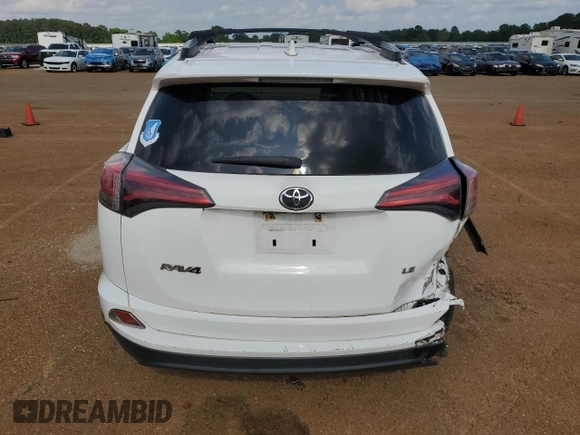 2016 Toyota RAV4 LE with VIN 2T3ZFREV8GW240448, listed as a Copart auction lot 54616795 with 103,567 mi miles and Salvage Title. Bid and sale history available at DreamBid. Image 6.