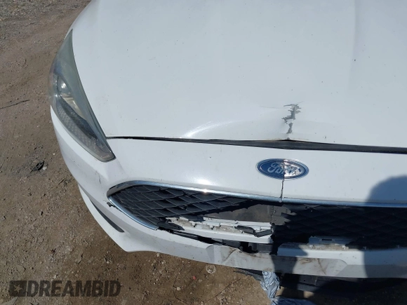 2016 Ford Focus SE with VIN 1FADP3F2XGL354565, listed as a IAAI auction lot 41590623 with 120,047 mi miles. Bid and sale history available at carsss.com. Image 6.
