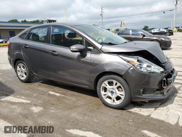 2015 Ford Fiesta SE z VIN 3FADP4BJ2FM114569, wystawiony jako Copart lot #56785265 z przebiegiem 71 045 mil mil oraz Szkoda całkowita • Salvage title. Historia ofert i sprzedaży dostępna na DreamBid. Obrazek 4.
