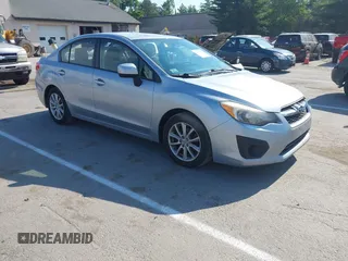 2014 Subaru Impreza Premium with VIN JF1GJAC61EH020032, listed as a IAAI auction lot 42639173 with 144,323 mi miles and . Bid and sale history available at DreamBid. Image 1.