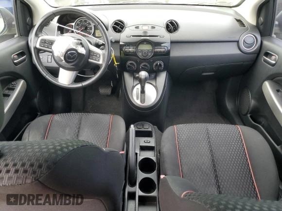 2011 Mazda 2 Touring z VIN JM1DE1HZ4B0115764, wystawiony jako Copart lot #56161455 z przebiegiem 134 274 mil mil oraz Szkoda całkowita • Salvage title. Historia ofert i sprzedaży dostępna na DreamBid. Obrazek 8.