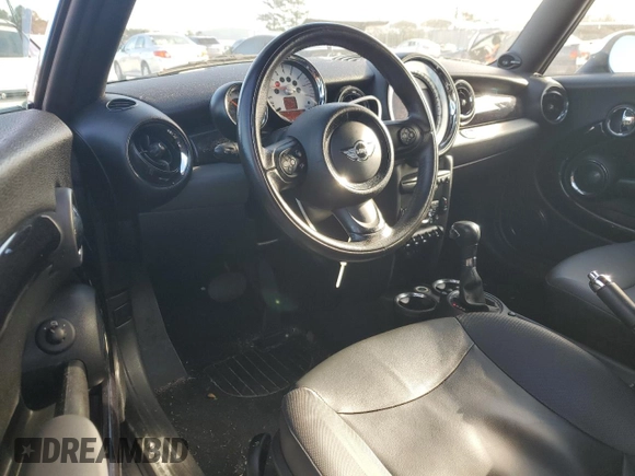 2011 MINI Convertible with VIN WMWZN3C53BT133576, listed as a Copart auction lot 87543835 with 69,999 mi miles and Salvage title. Bid and sale history available at DreamBid. Image 8.
