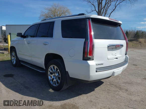 2017 GMC Yukon Denali with VIN 1GKS2CKJ4HR148397, listed as a IAAI auction lot 41942659 with 167,719 mi miles. Bid and sale history available at carsss.com. Image 3.