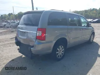 2016 Chrysler Town & Country Touring with VIN 2C4RC1BG1GR156868, listed as a IAAI auction lot 40506661 with 116,065 mi miles. Bid and sale history available at carsss.com. Image 4.