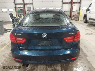 2014 BMW 3 Series Gran Turismo 328i xDrive with VIN WBA3X5C5XED557668, listed as a IAAI auction lot 41728522 with 123,393 mi miles. Bid and sale history available at carsss.com. Image 16.