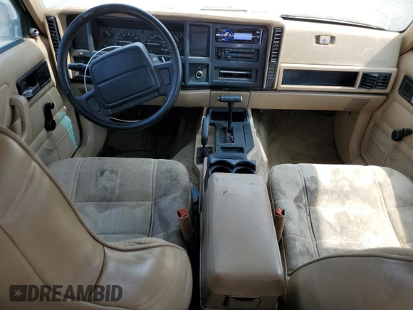 1996 Jeep Cherokee Sport with VIN 1J4FJ68S4TL146513, listed as a Copart auction lot 71039984 with 330,765 mi miles and Clean Title. Bid and sale history available at carsss.com. Image 8.