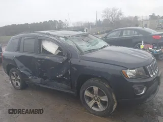 2016 Jeep Compass High Altitude Edition with VIN 1C4NJDEB0GD696124, listed as a IAAI auction lot 41973334 with 67,056 mi miles. Bid and sale history available at carsss.com. Image 6.