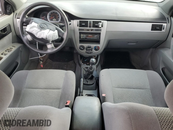 2006 Suzuki Forenza z VIN KL5JD56Z96K362651, wystawiony jako Copart lot #78306894 z przebiegiem 167 916 mil mil oraz Tytuł czysty. Historia ofert i sprzedaży dostępna na DreamBid. Obrazek 8.
