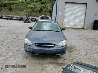 2000 Ford Taurus SE z VIN 1FAFP53U5YA259273, wystawiony jako Copart lot #52787305 z przebiegiem 234 848 mil mil oraz Szkoda całkowita • Salvage title. Historia ofert i sprzedaży dostępna na DreamBid. Obrazek 11.