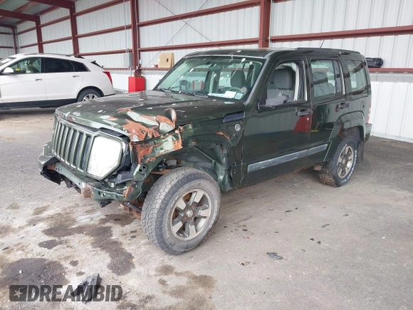 2008 Jeep Liberty Sport with VIN 1J8GN28K98W232003, listed as a IAAI auction lot 42127476 with 129,286 mi miles. Bid and sale history available at carsss.com. Image 2.