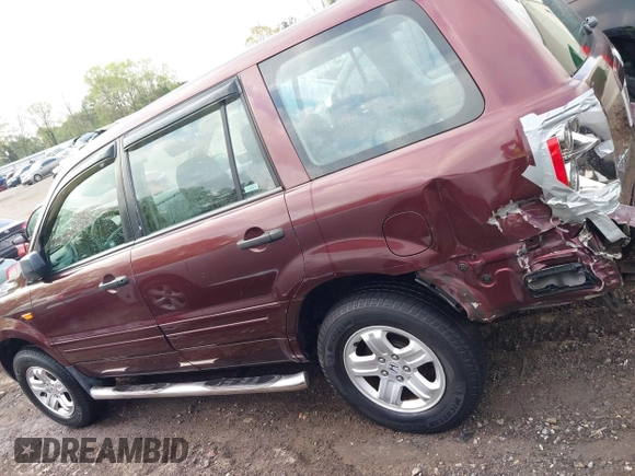 2007 Honda Pilot LX with VIN 5FNYF18127B031444, listed as a IAAI auction lot 41946281 with 169,794 mi miles and . Bid and sale history available at DreamBid. Image 14.