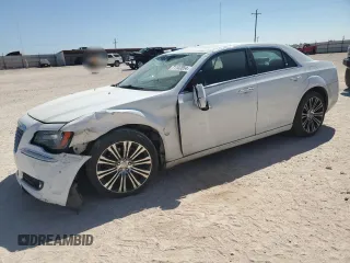2014 Chrysler 300 S with VIN 2C3CCABT7EH138823, listed as a Copart auction lot 71102854 with 111,069 mi miles and Salvage Title. Bid and sale history available at DreamBid. Image 1.