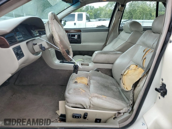 1995 Cadillac Seville Luxury SLS z VIN 1G6KS52Y7SU838169, wystawiony jako Copart lot #67941934 z przebiegiem 144 953 mil mil oraz Szkoda całkowita • Salvage title. Historia ofert i sprzedaży dostępna na DreamBid. Obrazek 7.