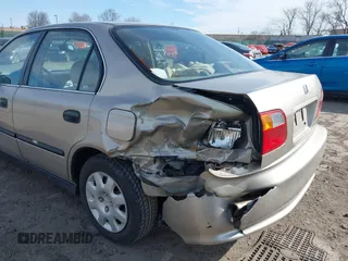 2000 Honda Civic LX with VIN 1HGEJ6679YL066102, listed as a IAAI auction lot 41585270 with 164,714 mi miles. Bid and sale history available at carsss.com. Image 6.