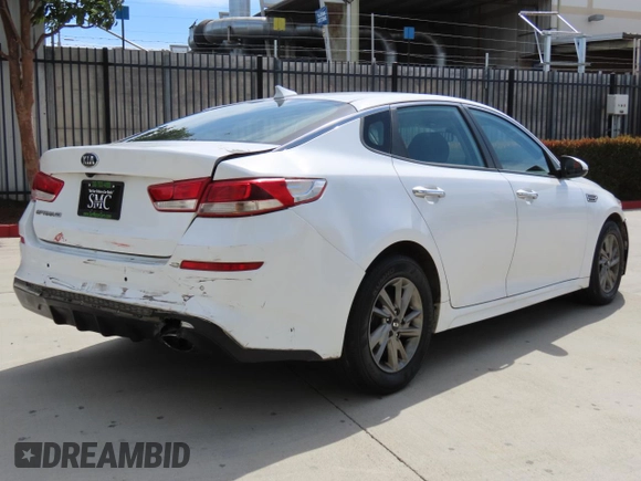 2019 Kia Optima LX with VIN 5XXGT4L36KG329998, listed as a Copart auction lot 52011715 with 123,942 mi miles and Salvage Title. Bid and sale history available at DreamBid. Image 4.