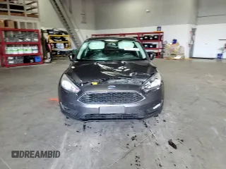 2016 Ford Focus SE z VIN 1FADP3F27GL216059, wystawiony jako Copart lot #59611395 z przebiegiem 170 468 mil mil oraz Szkoda całkowita • Salvage title. Historia ofert i sprzedaży dostępna na DreamBid. Obrazek 13.