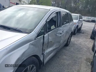 2012 Honda Odyssey EX-L with VIN 5FNRL5H66CB069916, listed as a IAAI auction lot 41935248 with 230,204 mi miles and . Bid and sale history available at carsss.com. Image 6.