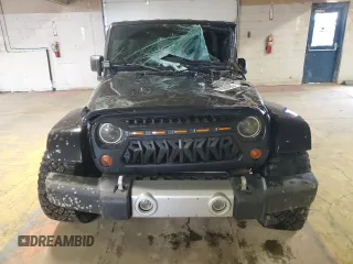 2008 Jeep Wrangler Unlimited Sahara with VIN 1J8GA59118L652519, listed as a Copart auction lot 47089285 with 144,682 mi miles and Non Repairable. Bid and sale history available at carsss.com. Image 5.