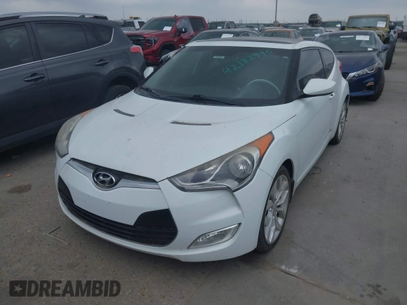 2013 Hyundai Veloster w/Black Int с VIN KMHTC6AD5DU166601, выставлен на аукционе IAAI как лот 42182995 с пробегом 143 106 миль миль и . История ставок и продаж доступна на DreamBid. Изображение 2.