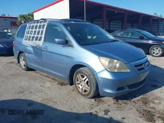 2007 Honda Odyssey EX-L z VIN 5FNRL38767B063018, wystawiony jako IAAI lot #37588346 z przebiegiem 297 423 mil mil oraz . Historia ofert i sprzedaży dostępna na DreamBid. Obrazek 1.
