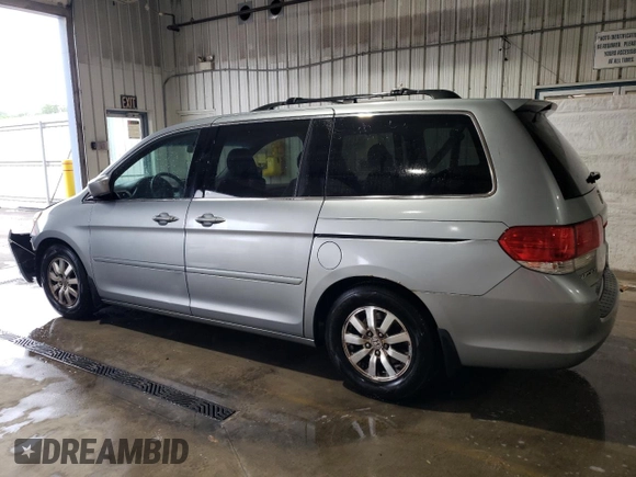 2010 Honda Odyssey EX with VIN 5FNRL3H42AB045192, listed as a Copart auction lot 55817925 with 133,712 mi miles and Salvage Title. Bid and sale history available at DreamBid. Image 2.