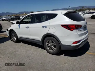 2018 Hyundai Santa Fe 2.4L with VIN 5NMZT3LB3JH095801, listed as a Copart auction lot 56068565 with 82,616 mi miles and Salvage title. Bid and sale history available at DreamBid. Image 2.