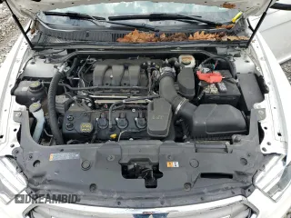 2016 Ford Taurus SEL with VIN 1FAHP2E84GG112803, listed as a Copart auction lot 54372645 with 79,999 mi miles and Salvage Title. Bid and sale history available at DreamBid. Image 11.