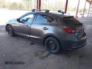 2018 Mazda 3 Touring with VIN 3MZBN1L35JM229453, listed as a IAAI auction lot 42123176 with 113,051 mi miles and . Bid and sale history available at DreamBid. Image 3.