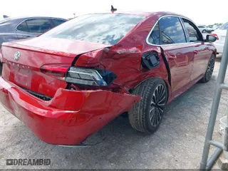 2022 Volkswagen Passat 2.0T Limited Edition with VIN 1VWBA7A30NC010134, listed as a IAAI auction lot 42052451 with 24,923 mi miles. Bid and sale history available at carsss.com. Image 4.